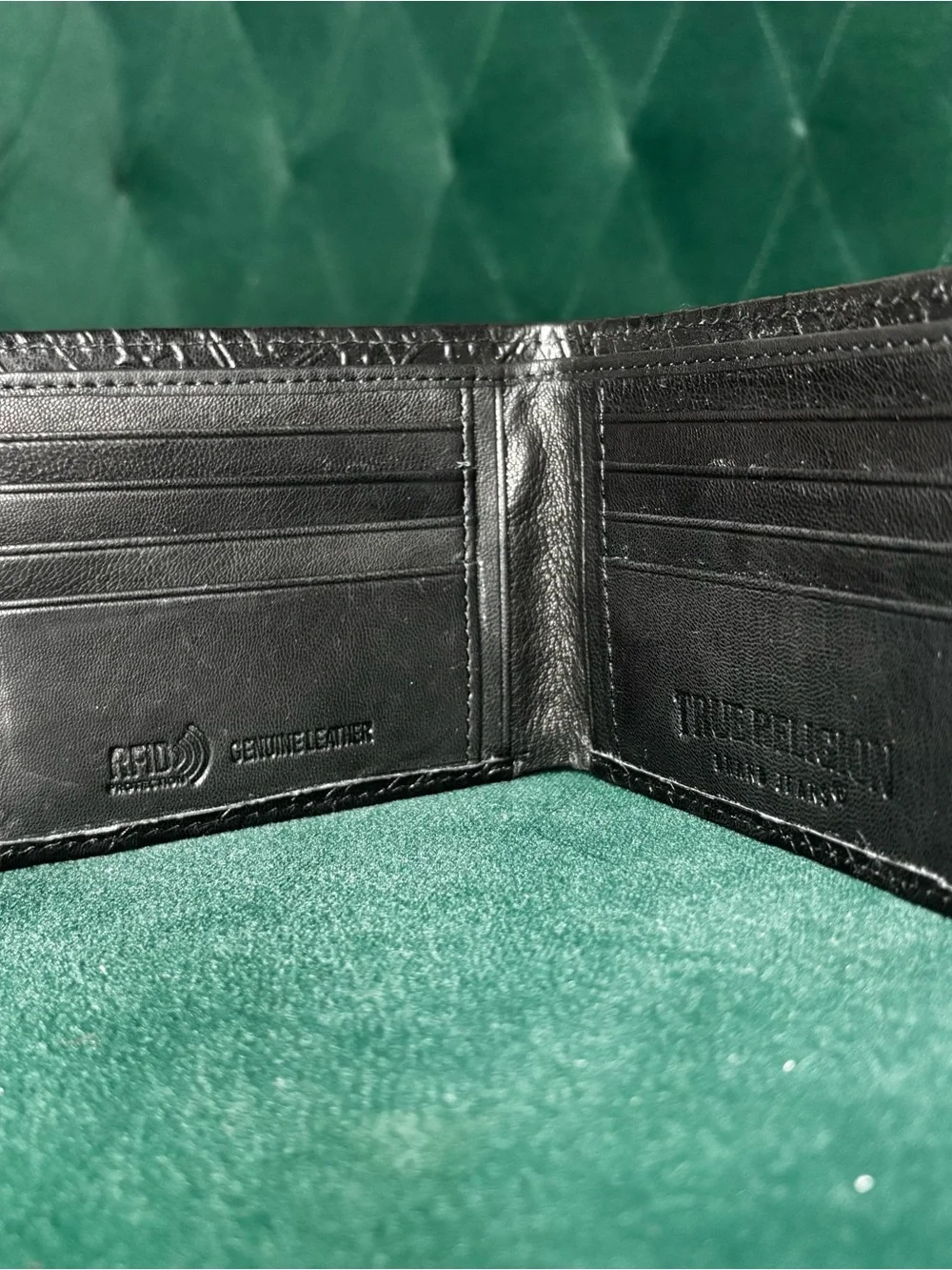 True Religion Black Embossed Leather Bi-Fold Wallet